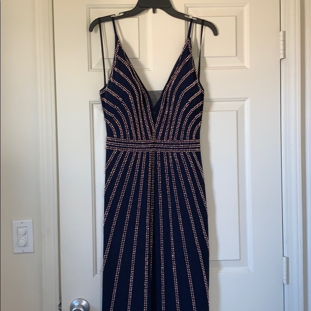 Xscape navy and rose gold beaded gown.